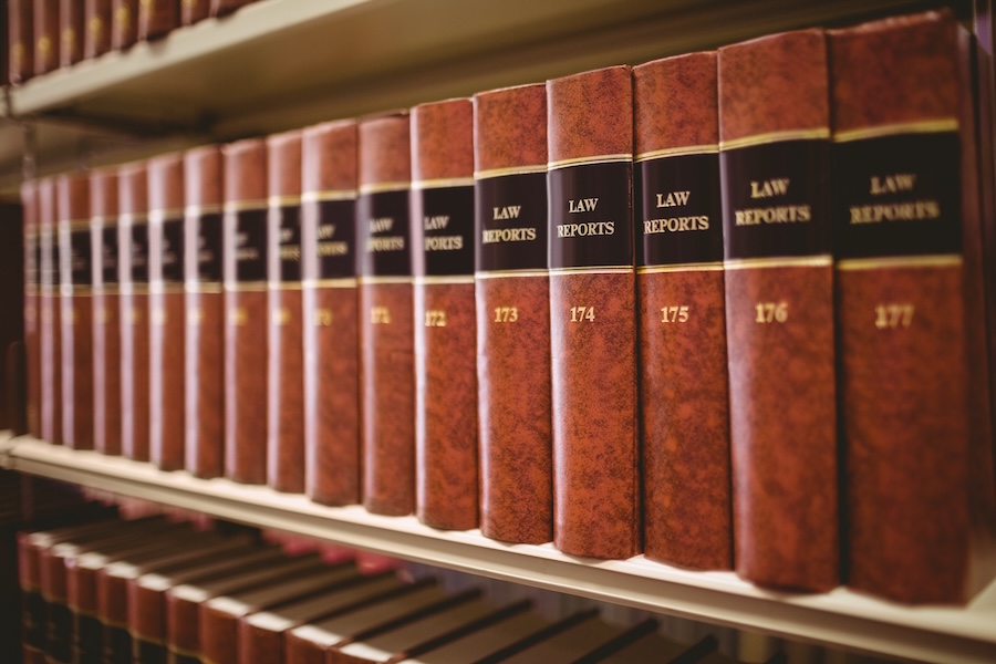 close up of a lot of law reports in library 2026 04 13 23 36 30 utc