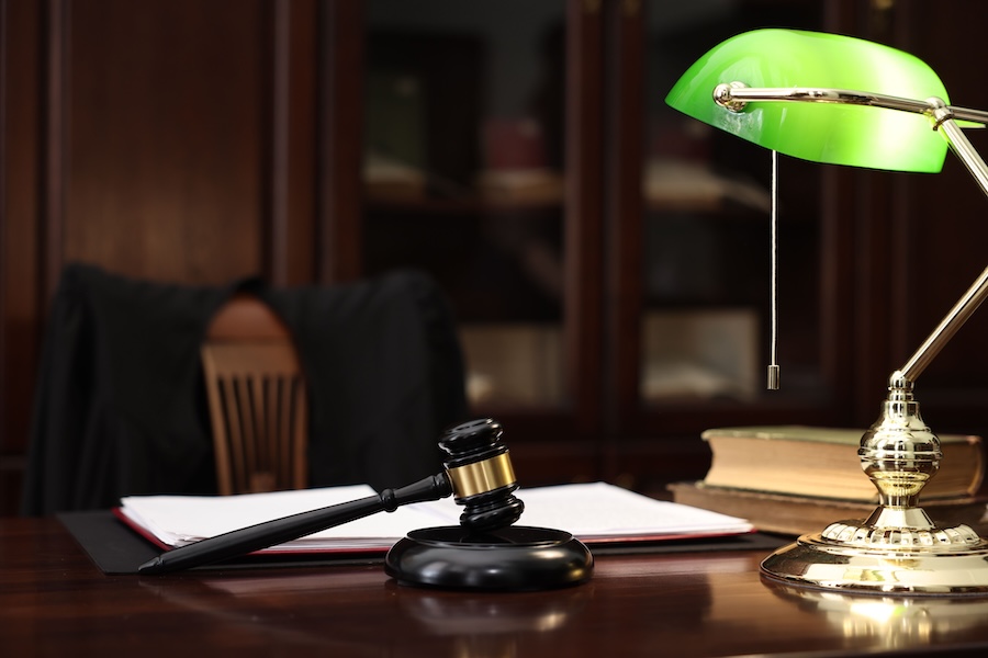judge workplace with gavel lamp documents and bo 2026 03 27 00 00 41 utc